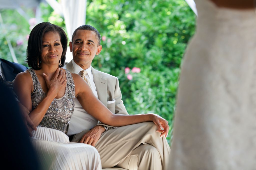 Barack and Michelle at a wedding